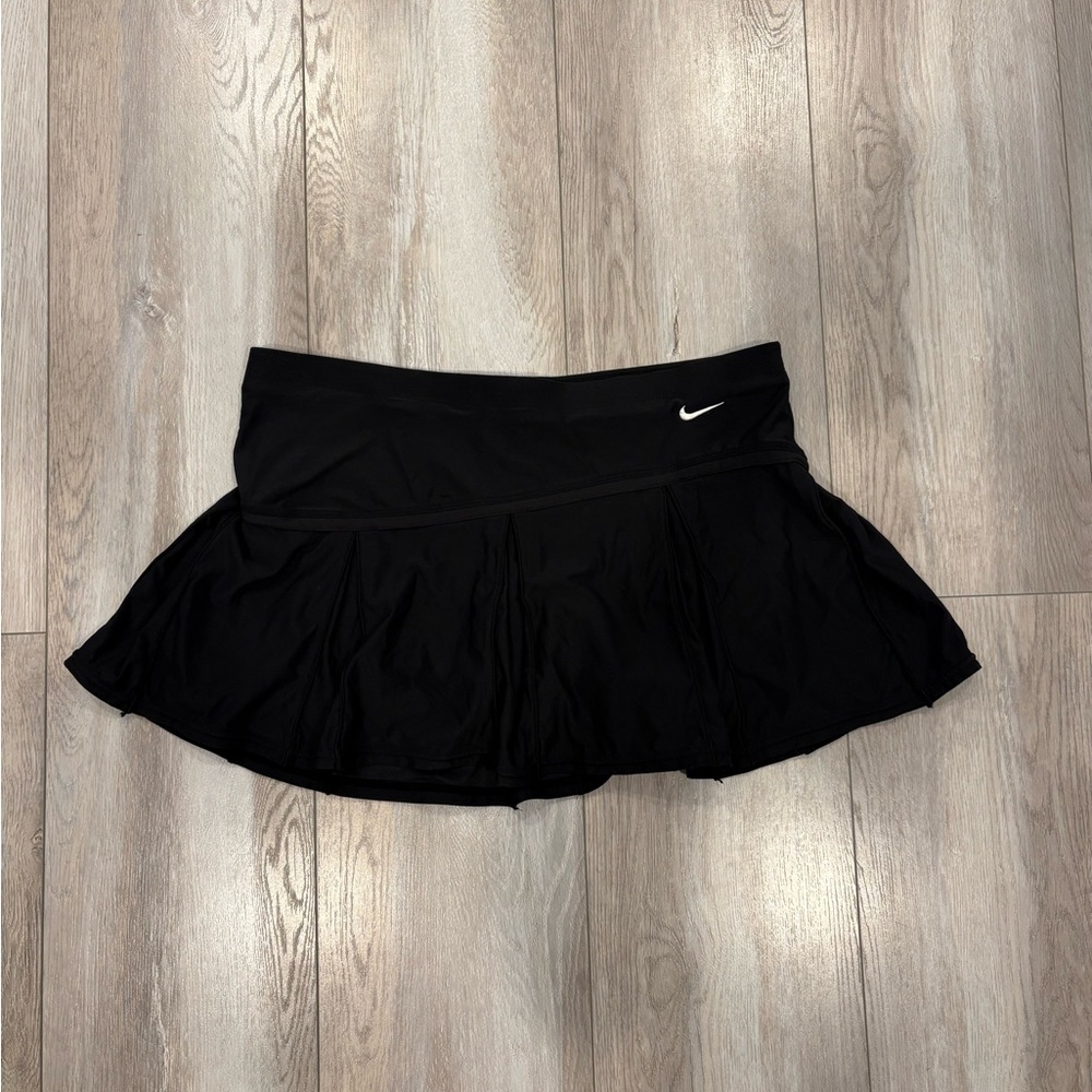 Nike black athletic mini skirt with built-in shorts. Size M
